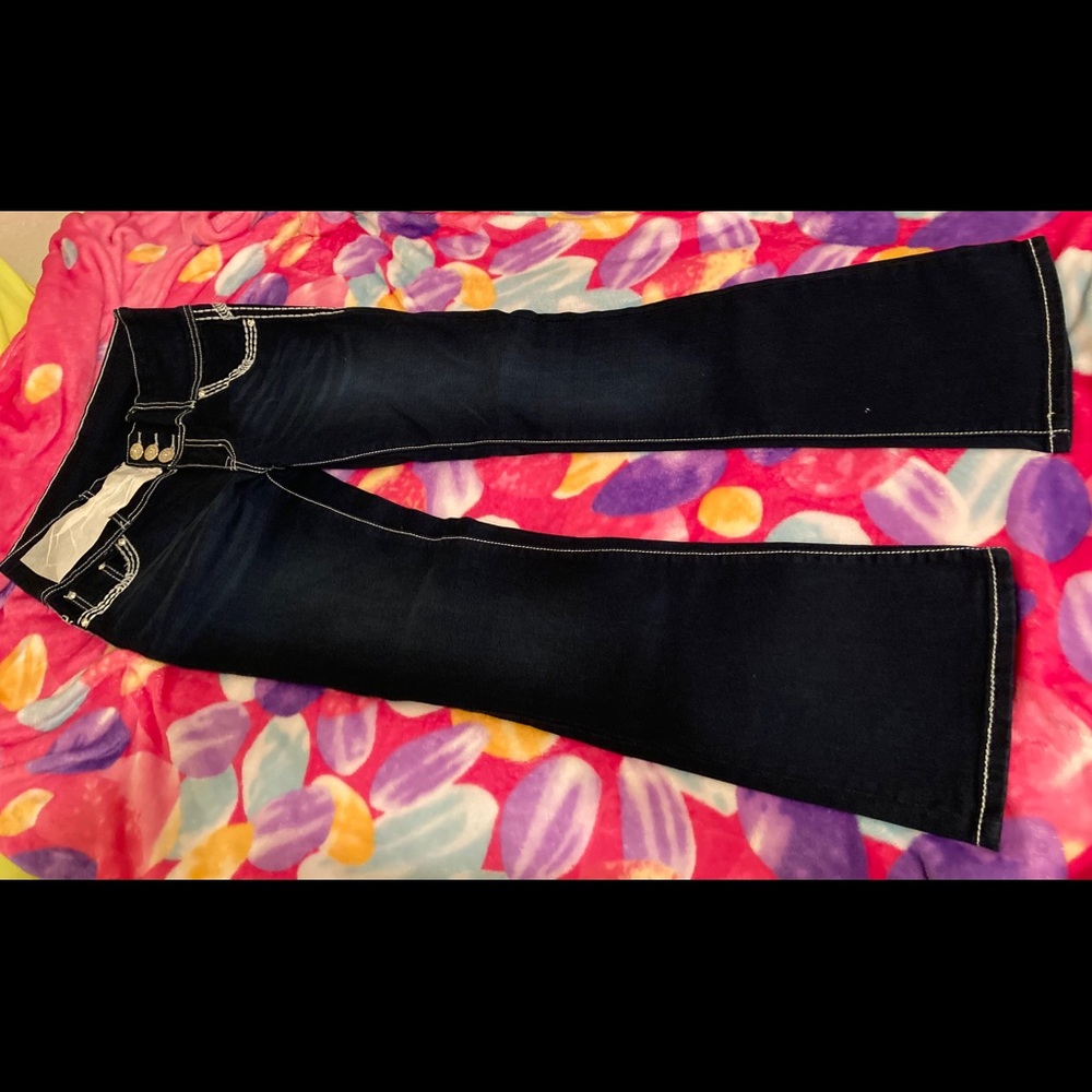 New push up jeans size 9 blue with pockets.